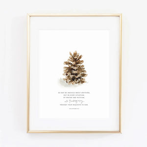 Philippians 4:6 pinecone scripture print with a watercolor pinecone above the verse, in a gold frame
